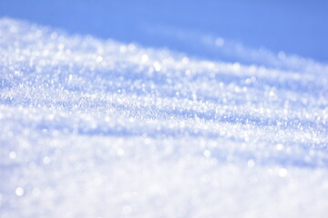 White snow closeup. Fluffy snow texture. Winter background with fresh snow 