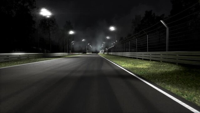 Modern racing car racing on a speedway at night