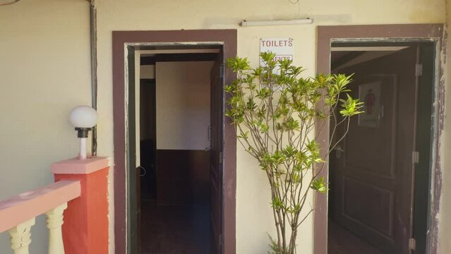 street public toilet men and women front view