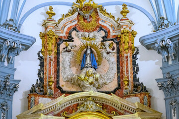 Fototapeta na wymiar Statue or figure of Virgin Mary inside of the Saint John of God Church (Century XVIII) in Murcia, Spain