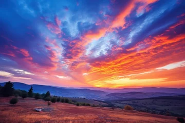 Papier Peint photo Violet Majestic sunrise or sunset landscape with stunning nature's light and rolling colorful clouds.