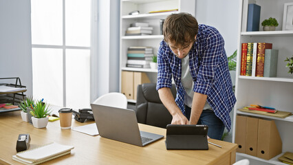 Young man business worker using touchpad working at the office