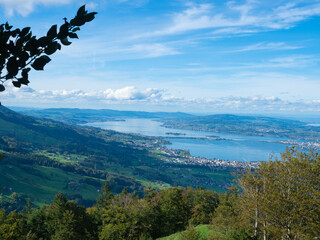 Zurich, Switzerland - Oktober 22nd 2023: View towards upper lake Zurich from the surrounding hills - obrazy, fototapety, plakaty