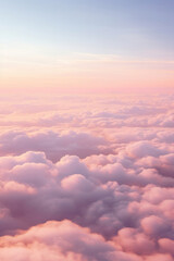 Aerial view of Beautiful sunrise sky above clouds or fog with dramatic light at dawn.