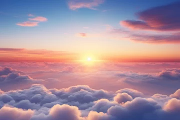 Fotobehang Beautiful sunrise sky above clouds with dramatic light in the morning. © Wararat