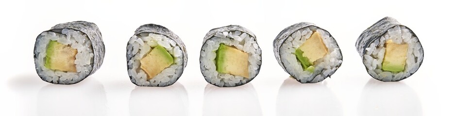 Five pieces of avocado sushi roll, aligned on a white background, display culinary simplicity and...