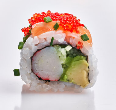  Single delicious salmon uramaki roll over isolated white background
