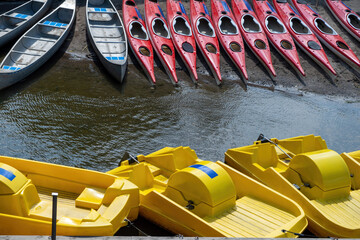 Canoe, kayak, paddle boat on sandy beach background. Adventure, activity, sport in sea, lake, river.