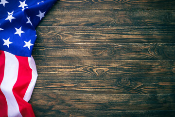 Fototapeta na wymiar American flag background, USA flag on wooden.