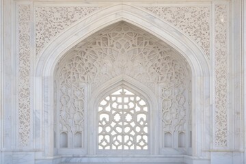 Fototapeta na wymiar Ornamented arched vault on white marble, latticed window, view from below, close-up in India, Agra