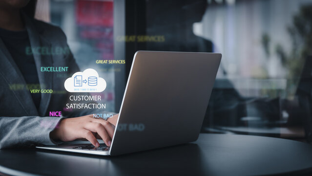 Businessman types on laptop for data storage, processing, and customer service evaluation, enhancing after-sales quality