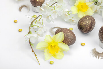 Fototapeta na wymiar Festive Easter composition with traditional decoration. Spring flowers, Eggs, flower lantern