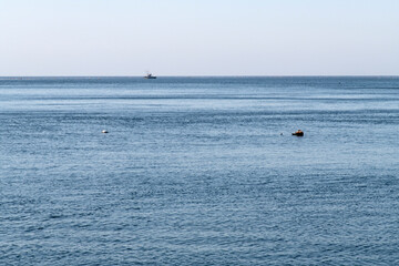 fishing boat in the blue sea