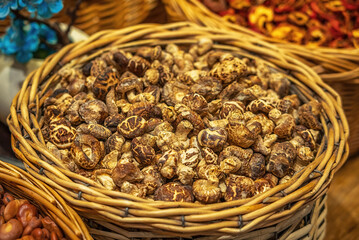 Exotic Dried Shiitake Mushrooms in a Rustic Basket