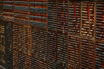 Detailed View of Traditional Chinese Abacuses on Display