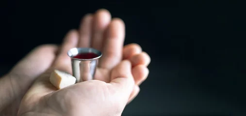 Fotobehang Holy Communion or Eucharist of christianity concept. Eucharist is sacrament instituted by Jesus. during last supper with disciples. Bread and wine is body and blood of Jesus Christ of Christians. © doidam10