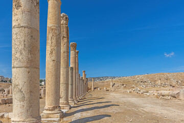Row of columns at the archaeological site of Jerash. Jordan. There is enough space for your use in the photo.