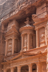 Vertical side view of the Treasury, one of the most elaborate temples in Petra archaeological site in Jordan.