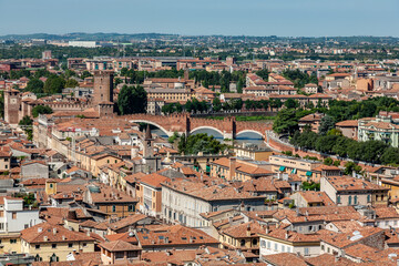 skyline of the beautiful Italian city Verona from Torre dei Lamberti to river Etsch with Ponte...