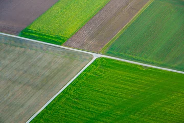 Gardinen rural landscape with fields from hot air balloon © travelview