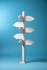 Wooden signpost on a blue background. Copy space.