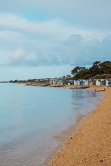 Foto op Canvas Beach huts on the beach along the Coast of England © Gabriel