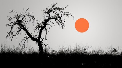 a black and white photo of a tree with an orange circle in the middle of the sun in the background.