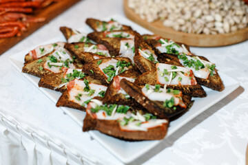 Catering buffet table with snacks and appetizers. Wedding event. Ukrainian food