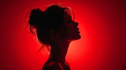 Sensual Woman Silhouette on Red Background