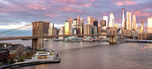Panoramic view of Brooklyn Bridge at sunrise in New York. USA