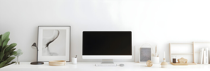 Displaying a tranquil environment through its immaculate white background and softly blurred photograph, the workspace embodies a serene and minimalist aesthetic.
