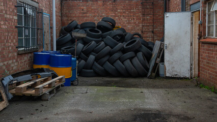 Background of used tyres stacking on the floor
