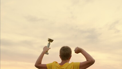 Concept of children sports victories. Boy, Healthy lifestyle. Child is winner, champion since...