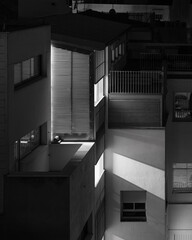 Abstract urban night scene with architectural elements and light contrasts