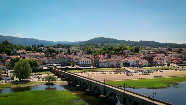 Ponte de Lima town center with the Romanic bridge on the foreground - Aerial establishing shot
