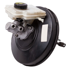 Black metal vacuum brake booster for repair and replacement on a car in a workshop on a white...
