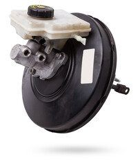 Black metal vacuum brake booster for repair and replacement on a car in a workshop on a white isolated background. Spare parts catalog for cars.