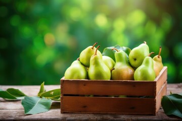 abstract colorful background of ripe pears in a wooden box