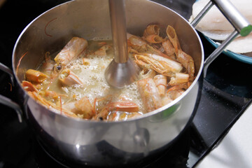 Fish in sauce with shrimp. Step by step preparation. Fumet with shrimp shells