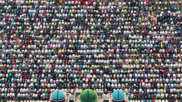 Vibrant celebration of Eid prayer in Bangladesh as Muslims gather in Eidgah, embodying unity, devotion, and cultural richness, marking the joyous occasion with rituals and communal spirit