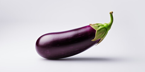 Closeup of a eggplant on a light purple background