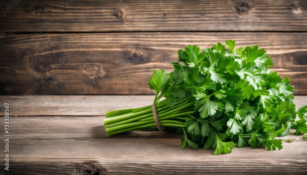 Poster A bunch of green herbs on a wooden table