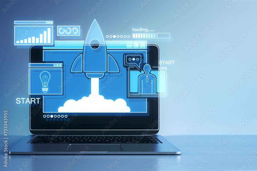 Poster close up of laptop on desk with creative glowing rocket ship hologram on blue background. start up a