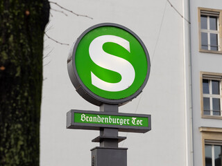 S train station in Berlin at the Brandenburger Tor. Sign of the entrance of the public transportation building to get to the platform. Travel destination of many tourists in the capital city Germany. © Felix Geringswald