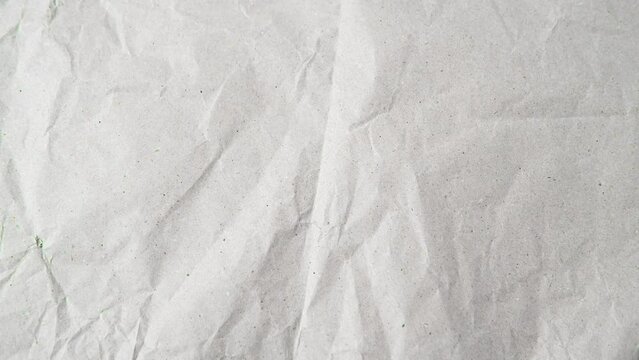 stopmotion crumpled paper texture background , 4K transition footage on black and green screen