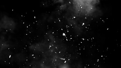 Blurred fire embers sparks on black background . Texture isolated overlays. Concept of particles, sparkles, flame and light.