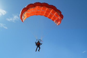 Skydiver performing canopy control maneuvers. Generative AI