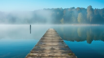  lake with wooden pier disappearing into fog