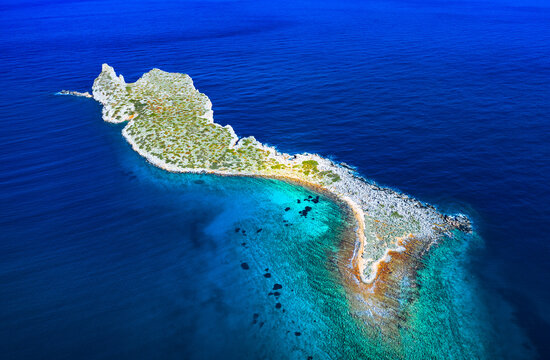 Glaronisi island near the amazing beach of Kolokitha, Elounda, Crete, Greece.