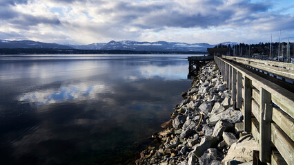 View looking down the Comox Harbour
 breakwater, on a beautiful winter day.